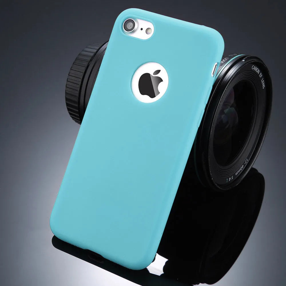 USLION soft silicone TPU phone case in Candy Colours for iPhone models on a table.