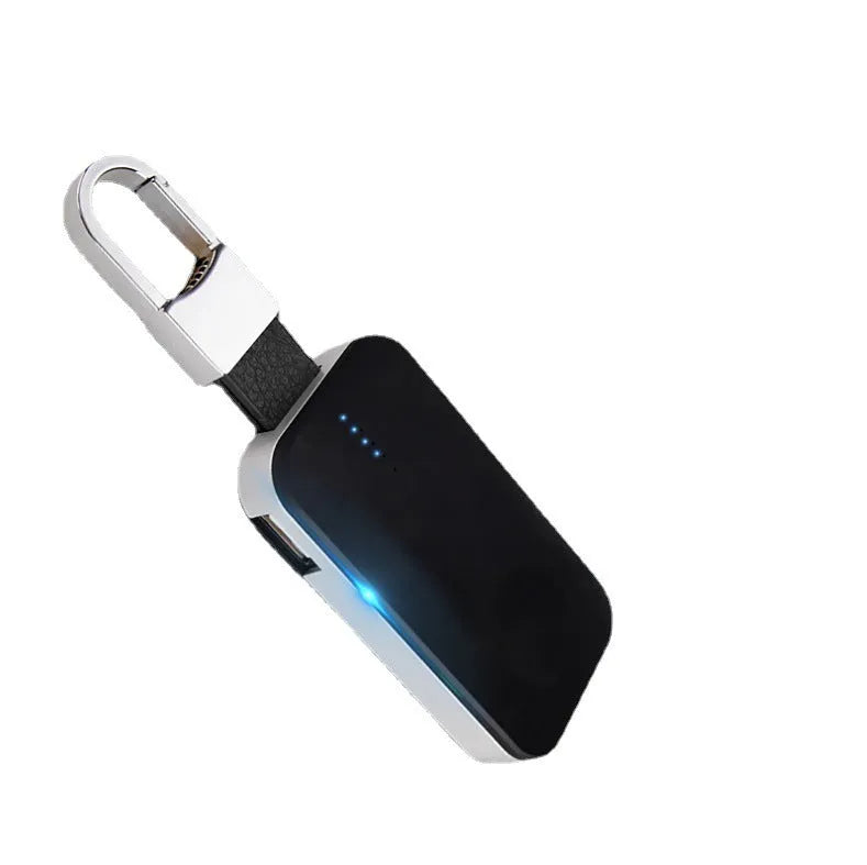 Black portable Apple Watch wireless charging power bank on a keyring