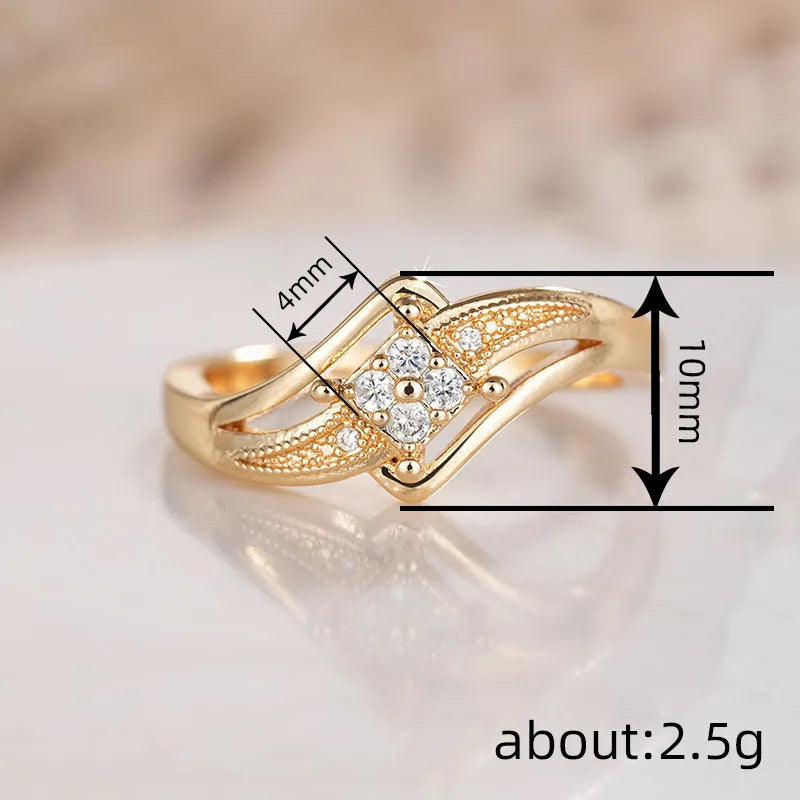 Yellow gold coloured copper diamond ring with geometric design and micro inlaid zircon detail.