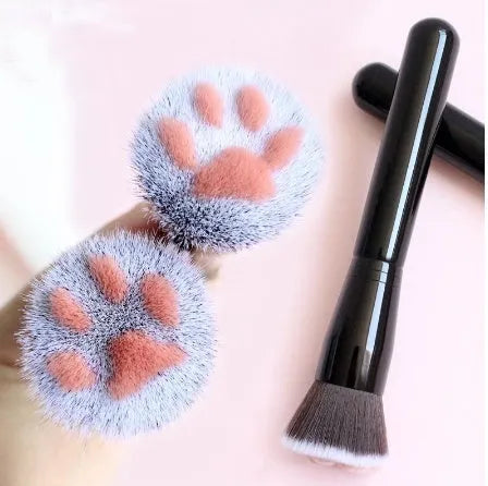 Cat paw brush with fibre bristles, birch wood handle, and aluminium tube in black colour option