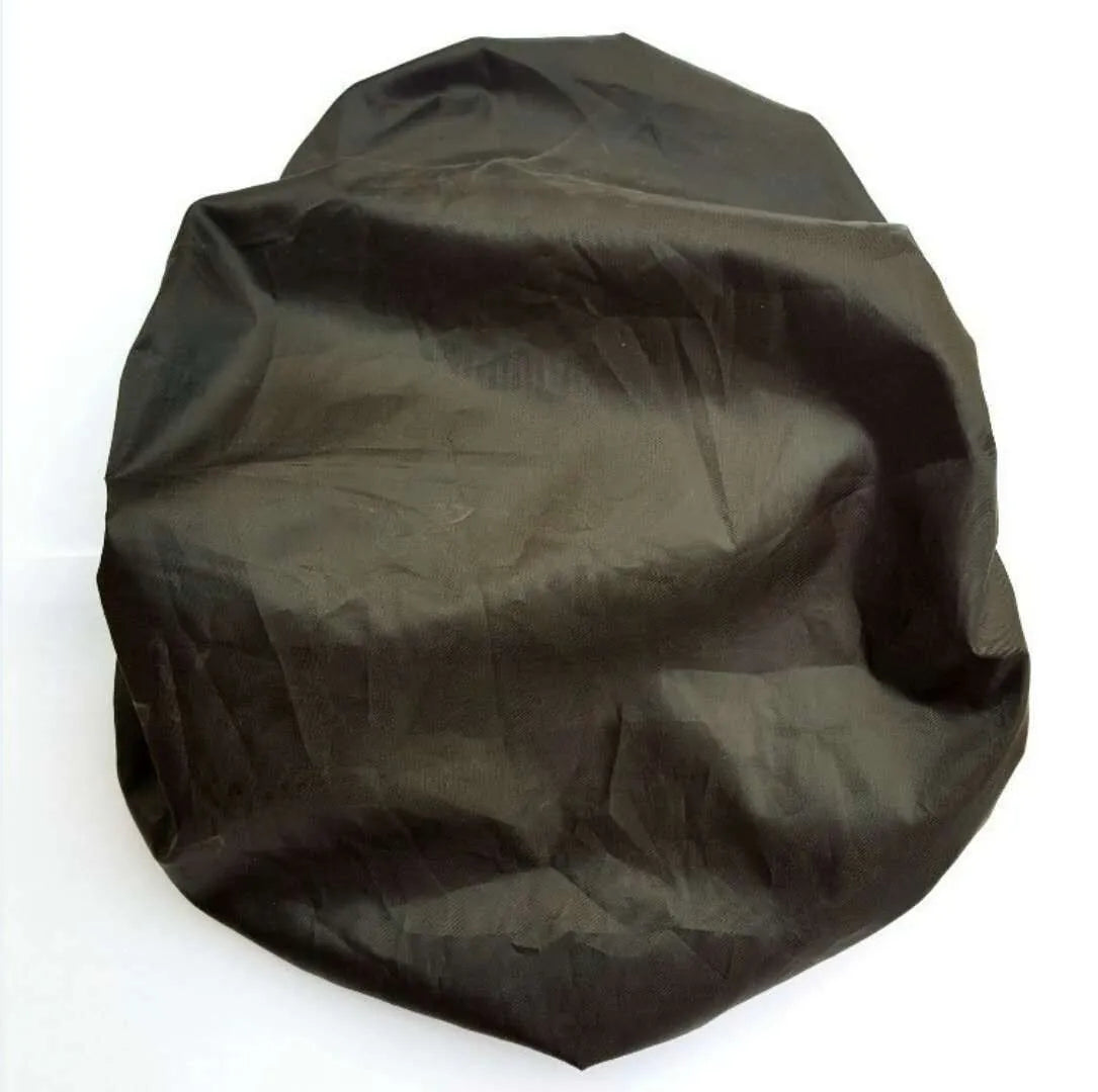 Bicycle saddle cushion with silicone padding and waterproof cover alongside wrench and patch kit