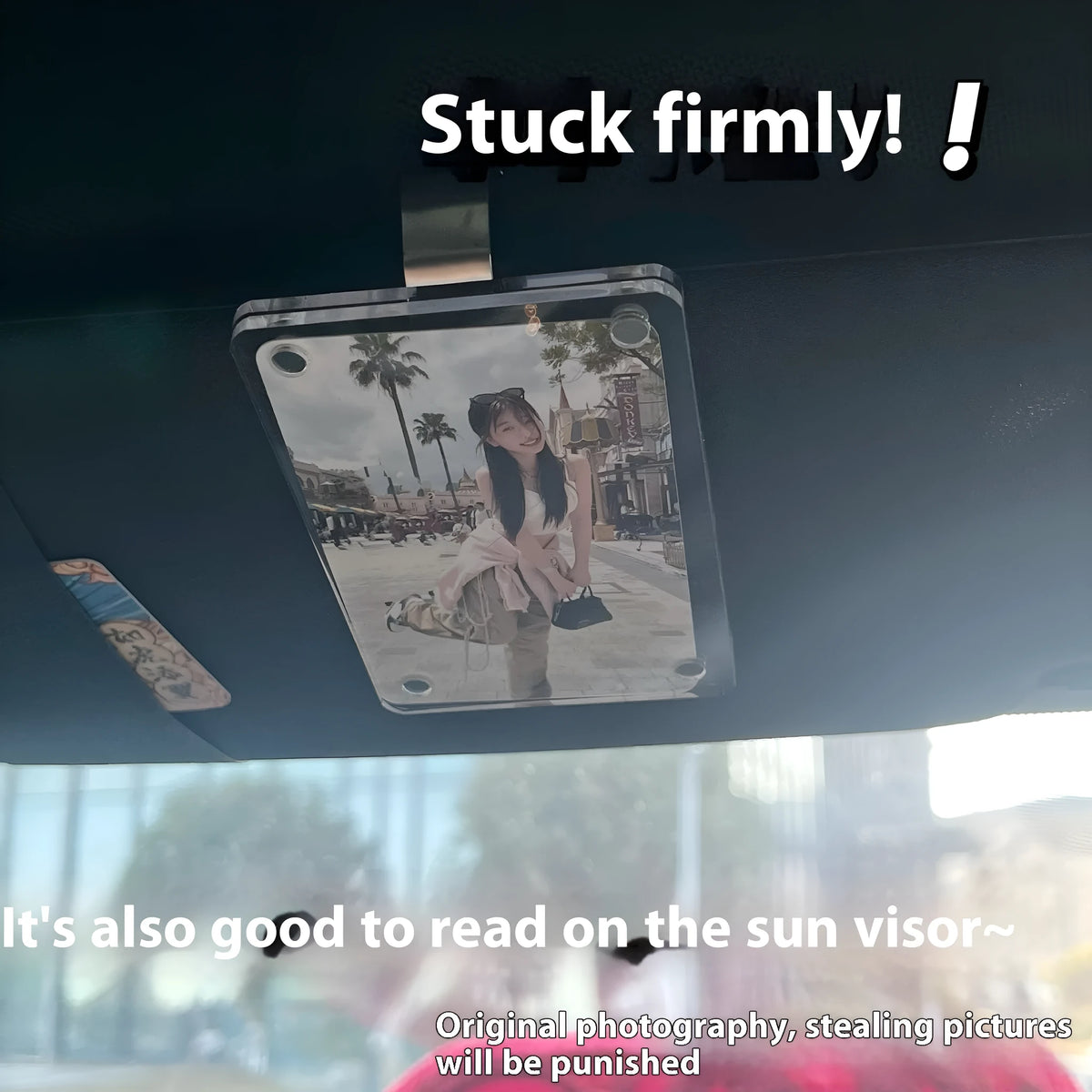Clear acrylic magnetic photo frame clip 6x9cm holding a photo on a refrigerator