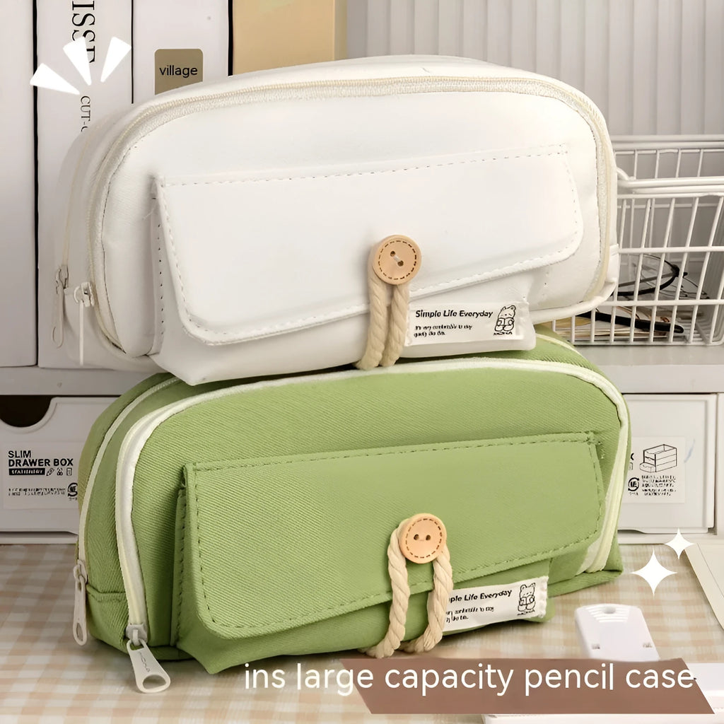 Girls canvas pencil case with button fastening showing large capacity for approximately 80 pens in beige colour