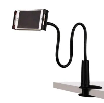 Black aluminium alloy and plastic bedside phone handset with long arm extended on a wooden table.