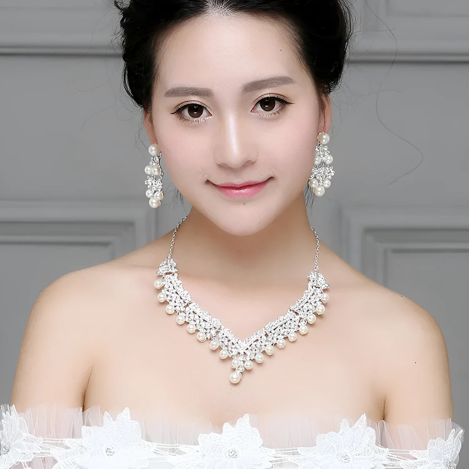 White pearl bridal jewellery set with necklace earrings and hair accessory with diamond accents style 0284