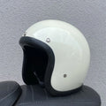 Retro-style glass fibre motorcycle half helmet shown in multiple colour options for adult commuters
