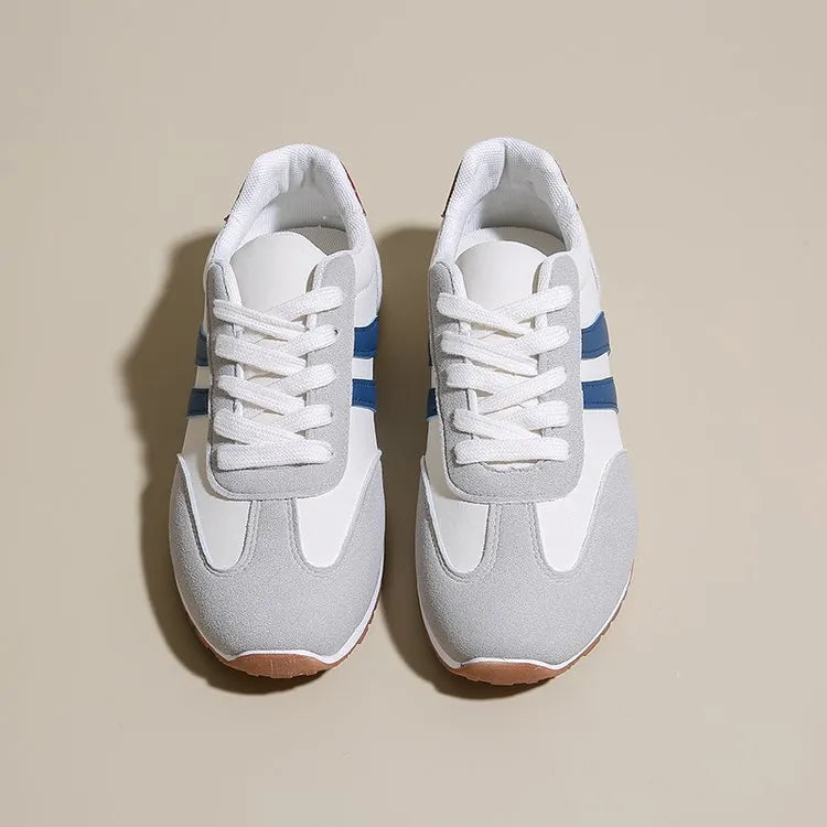 Blue and grey striped Cortez-style leisure sports shoes with a flat rubber sole.