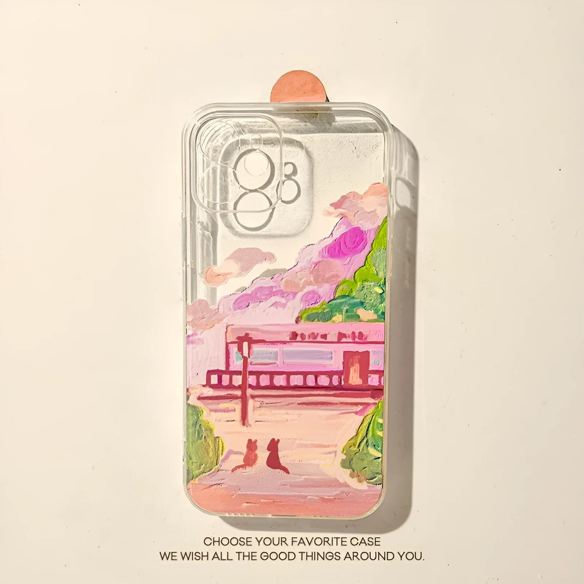 Soft silicone iPhone case with a colourful two cat cartoon design on the back.