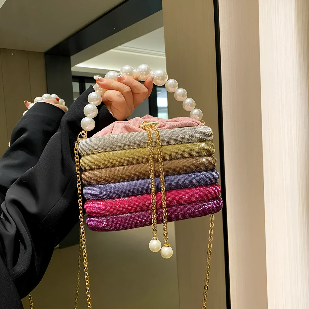 Women's retro style crossbody bag with pearl beading in soft PU, round shape with single strap.