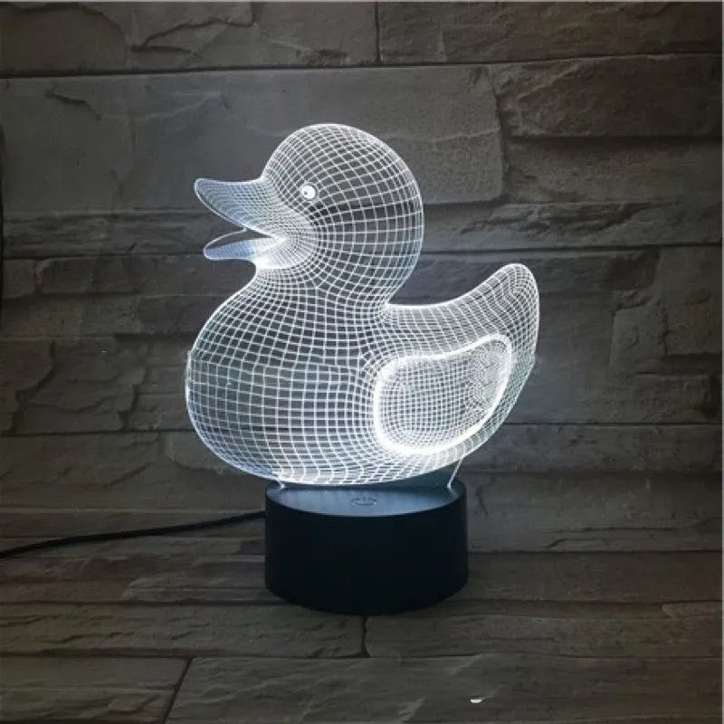 Little Yellow Duck 3D LED night light showing acrylic duck shape on ABS base, with remote control.