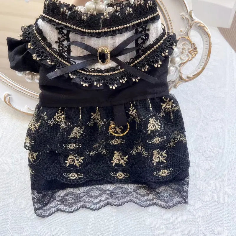 Golden Gothic princess-style skirt costume for a small dog or cat on a mannequin