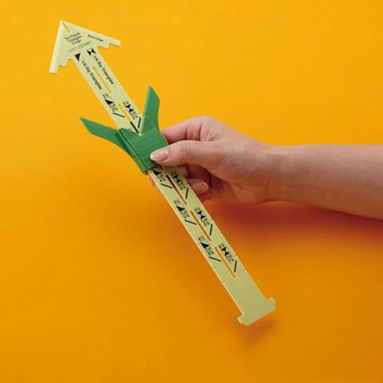 Clear patchwork rulers in two sizes (21x8cm and 33x9cm) on a fabric cutting mat with a rotary cutter