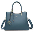 Women's black PU leather messenger bag with multi-layer shoulder strap and sewing thread detailing