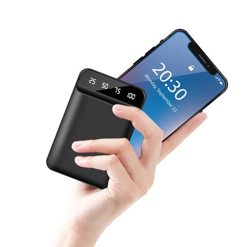 Compact mini power bank in black, blue, pink, or white, showing size compared to a hand.
