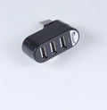 Black and white USB 2.0 hub with spin design showing multiple USB ports