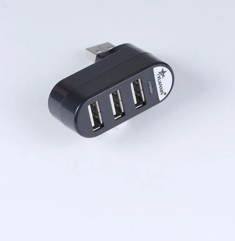 Black and white USB 2.0 hub with spin design showing multiple USB ports