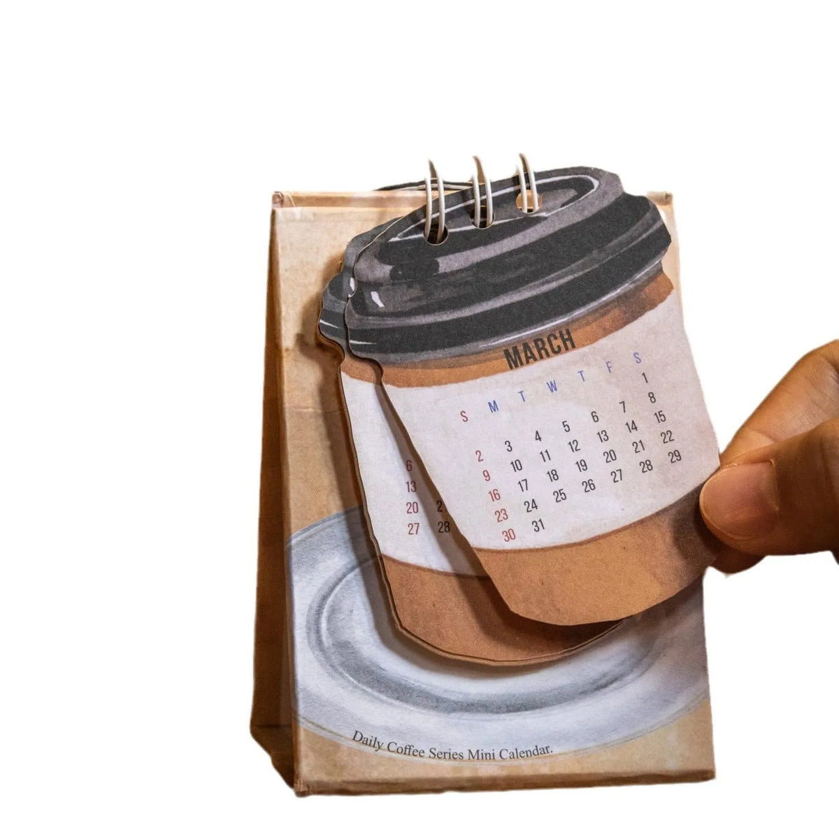 Coffee-themed mini desk calendar for 2025 with motivational designs for compact organisation