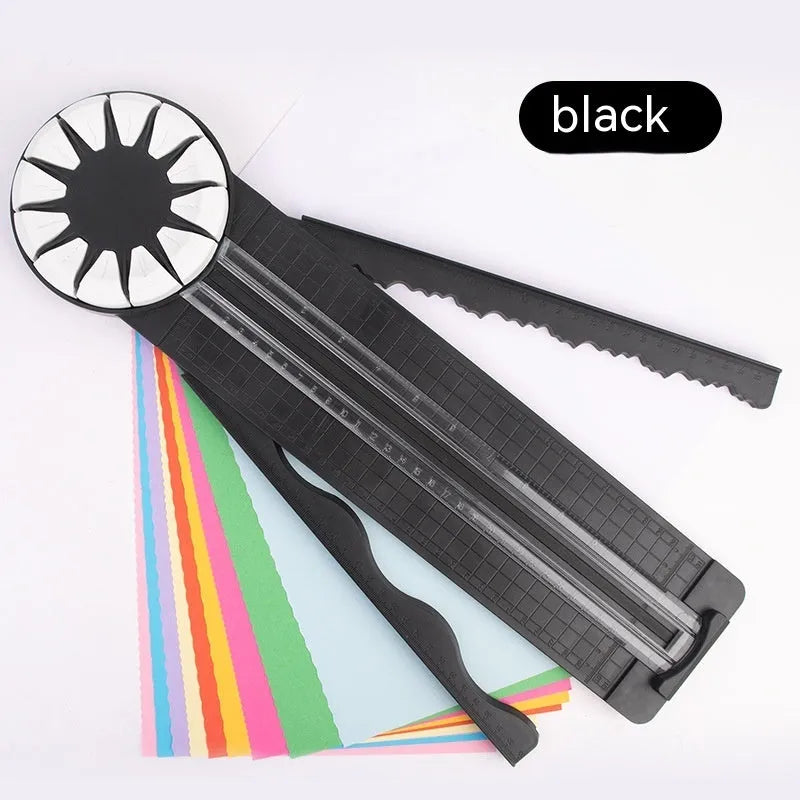 Pink plastic paper cutting machine with dotted alignment guides and 12 cutting patterns