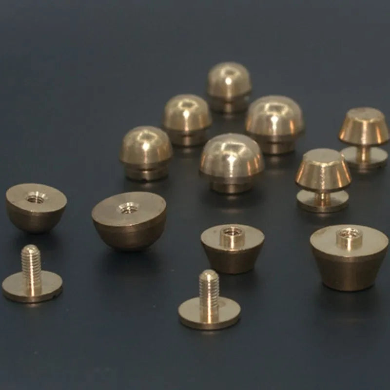 Brass decorative buckles in 10x6mm and 12x7mm sizes with round and geometric foot nail shapes