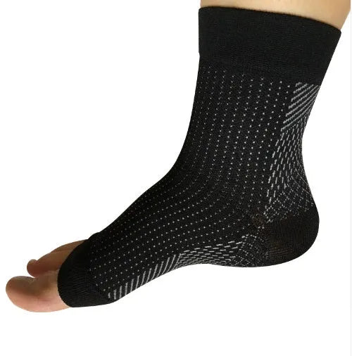 Nylon compression ankle support sleeve with heel hole, breathable and moisture-wicking, in black, red, or white.