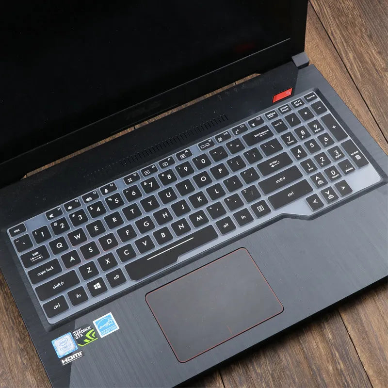 ASUS Flight laptop keyboard protective film cover in multiple colour options showing translucent and gradient designs