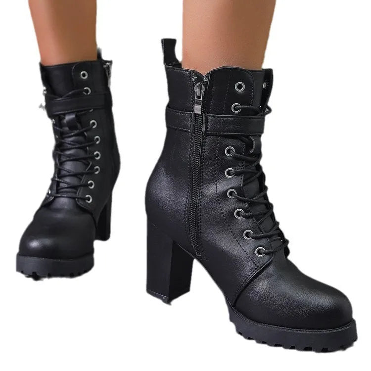 Women's plus size Martin ankle boots in black or dark brown with belt buckle, side zipper, and short stout heel, sizes 35-42