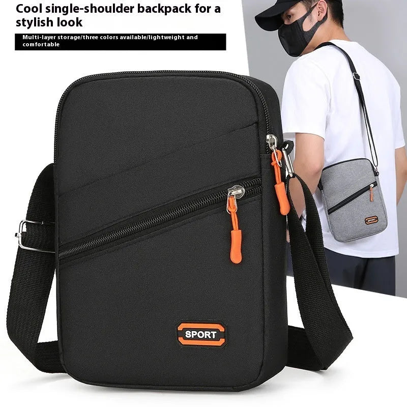 Ultra light Oxford cloth crossbody commuter bag in solid black, navy blue, or silver grey colour.