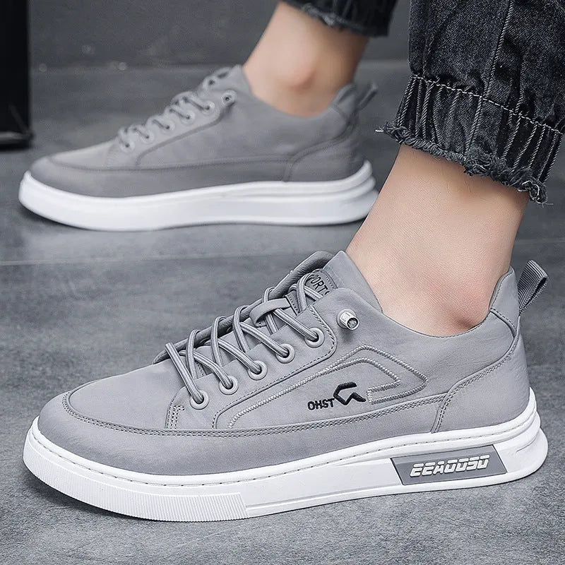 Grey men's casual canvas shoes with round toe and lace-up design featuring breathable construction
