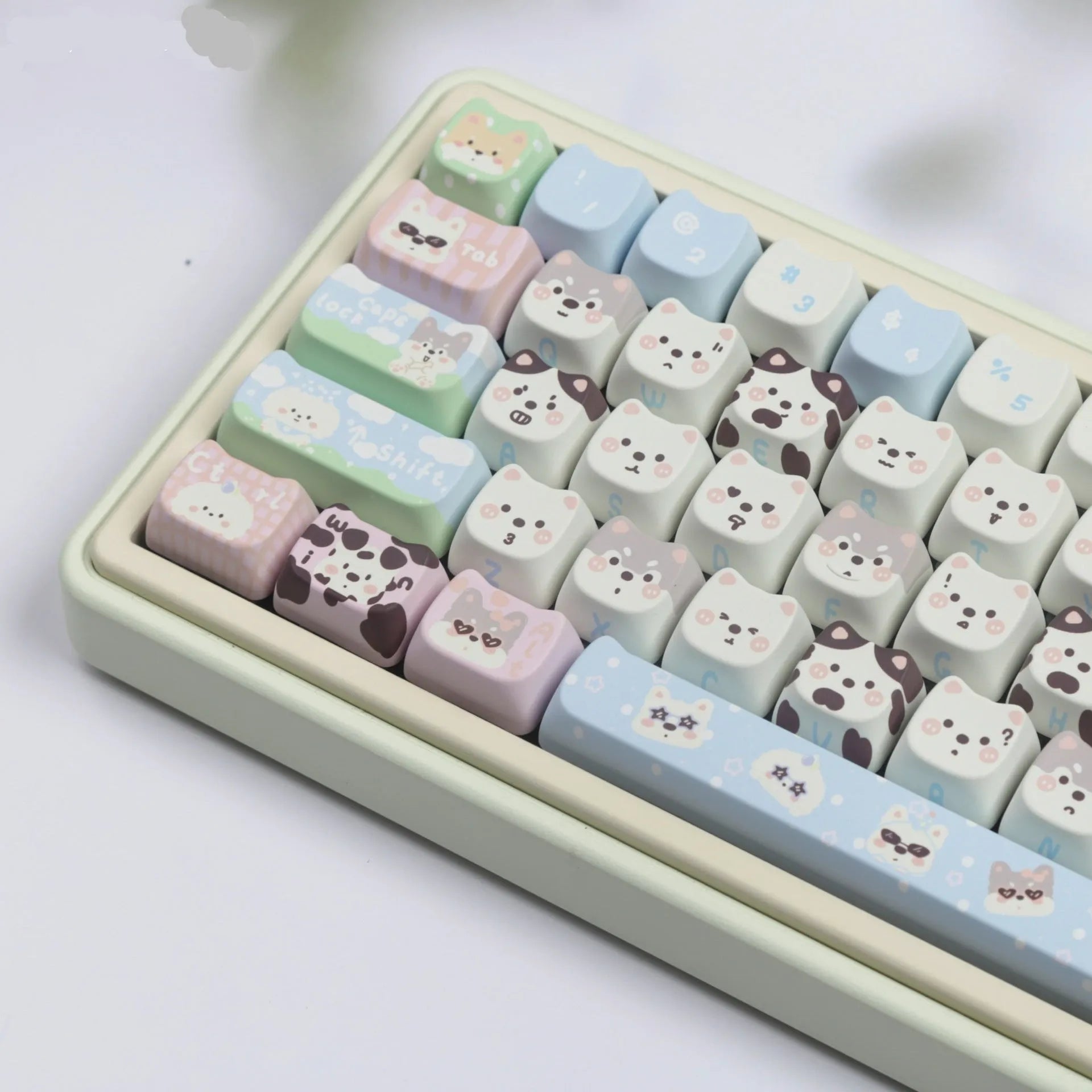 Colourful puppy character PBT key cap set for mechanical keyboards with 26 alphabetical characters.