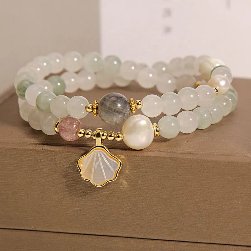 Tianshan emerald green crystal bracelet with gold-plated ginkgo leaf pendant and rhinestone accents