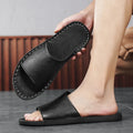 Brown men's leather sandal with rubber sole on a white background