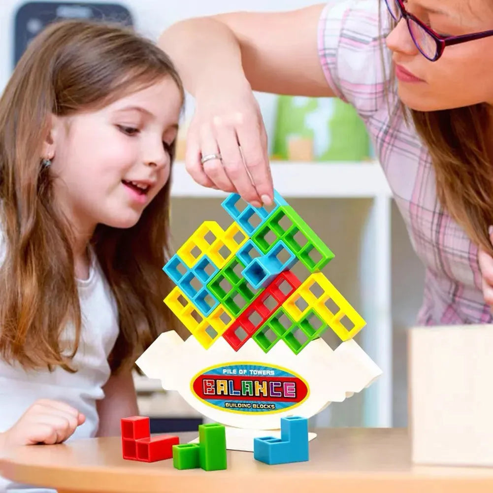 Plastic balance stacking game with 16 colourful blocks and chassis for family play