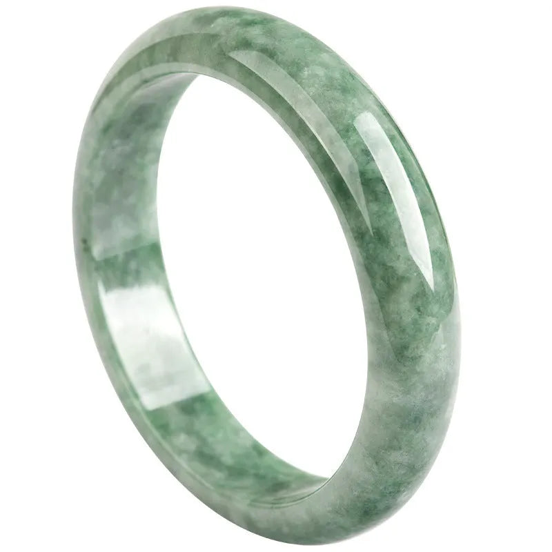 Natural emerald bean green jade beaded bracelet for women on a gift box.