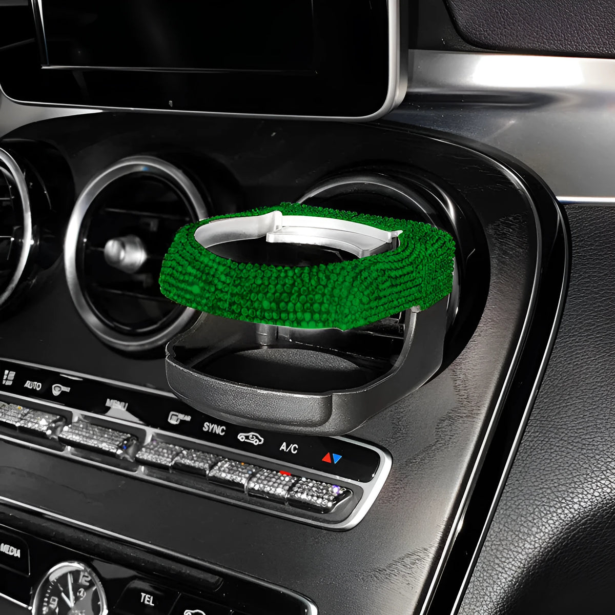 Car interior water cup bracket with decorative diamond accents mounted on air vent