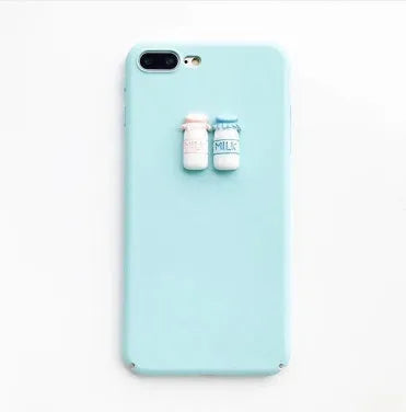 Soft pink silicone TPU phone case with a raised 3D cartoon cat design on the back, fitted to an iPhone.