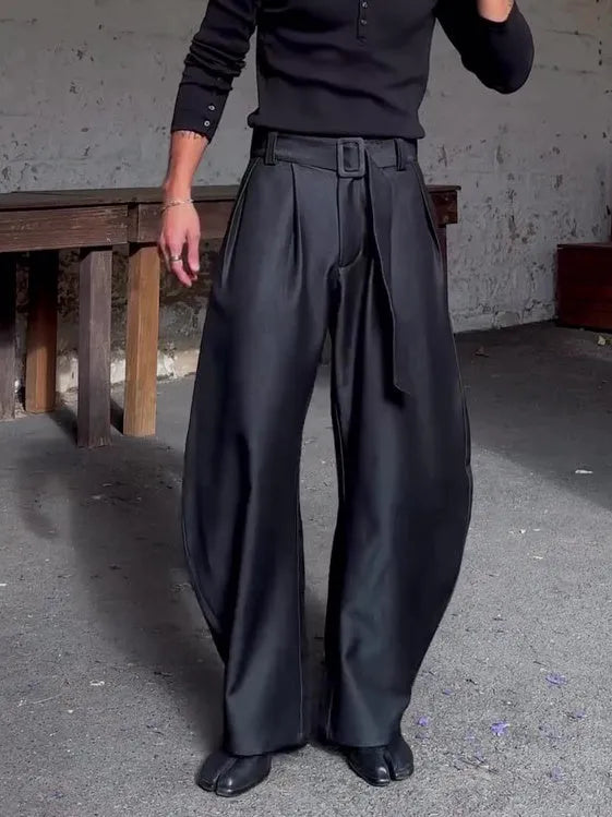 Chic black oversized wide-leg pants with high-waisted belt