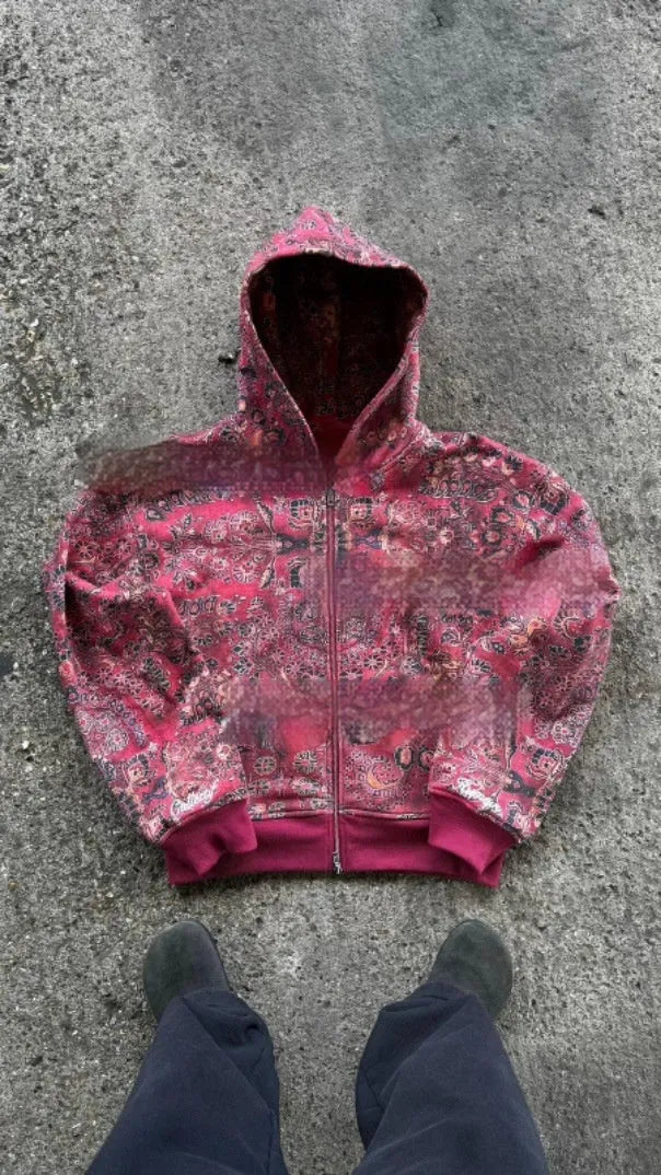 Men's red loose hooded zip coat with long sleeves on a hanger