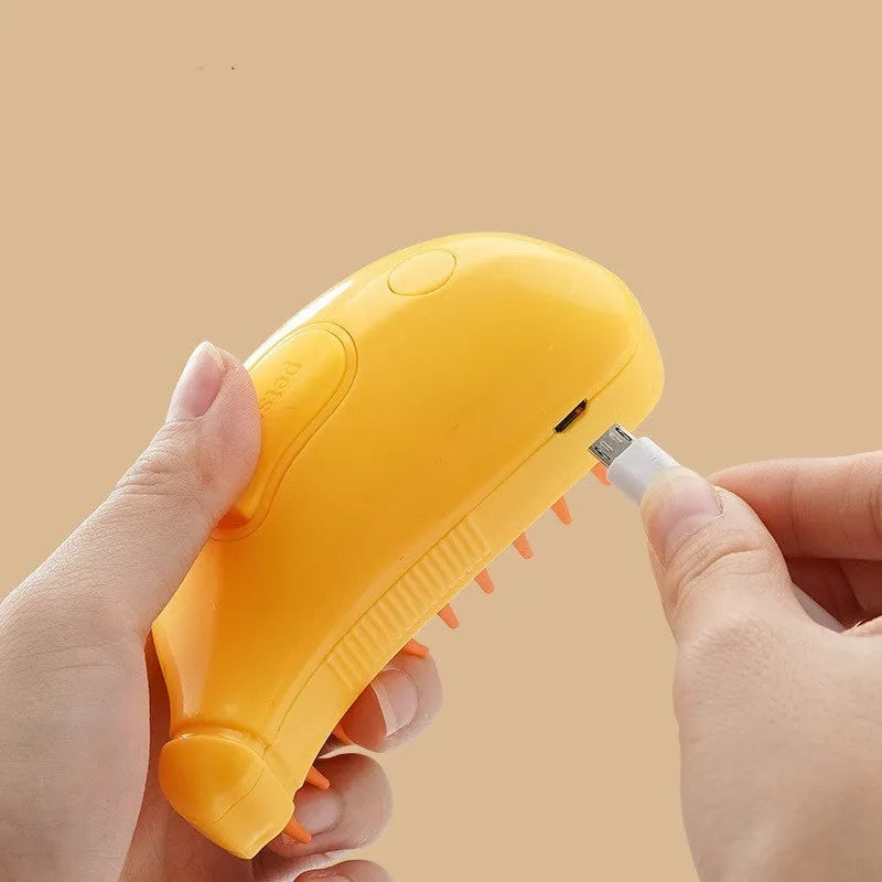 3-in-1 pet steam brush in green for cats and dogs with USB rechargeable design