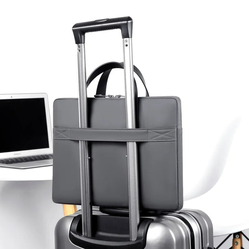 Ultra-thin leather laptop case in light gray with zipper closure and soft handle for 15.6-inch laptop