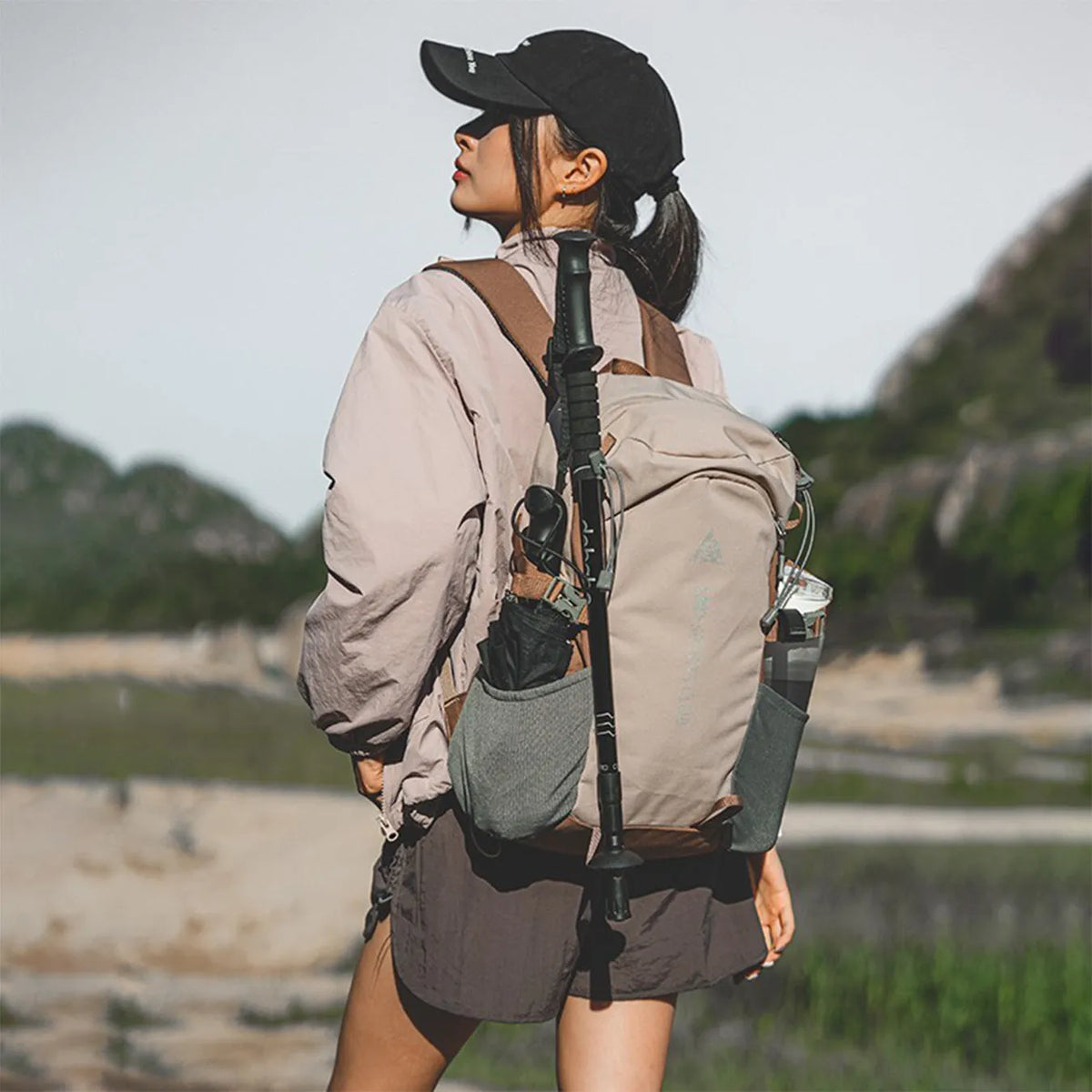Waterproof Oxford cloth hiking backpack with air pillow belt, letter pattern and unisex design for outdoor sports