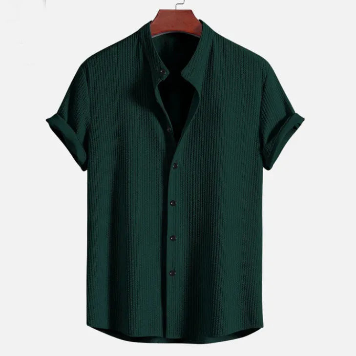 Men's loose-fitting short sleeve casual shirt in light blue polyester fabric.