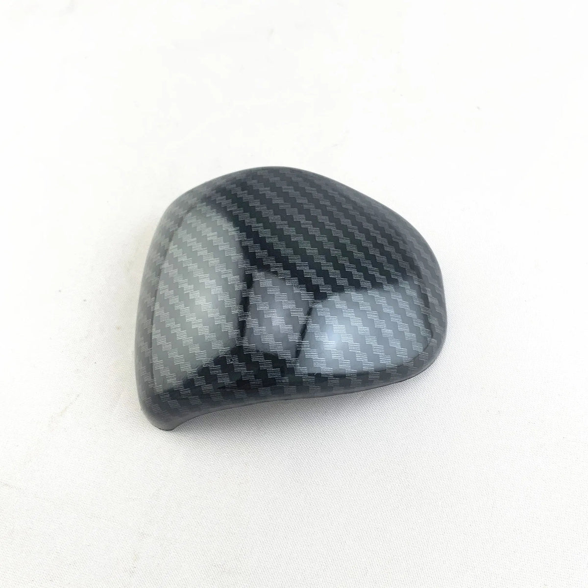 Car gear shift cover with carbon fibre pattern finish