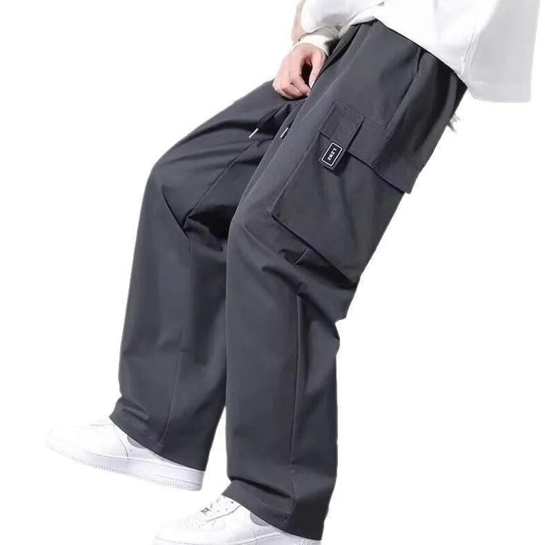 Boys straight leg cargo pants with drawstring waist and large pockets in Army Green