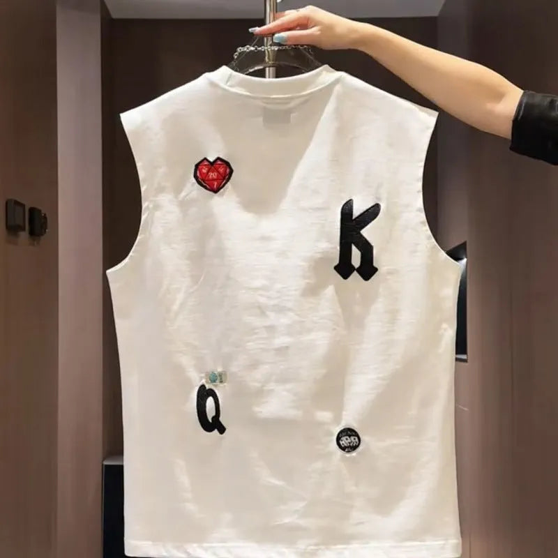 Men's black cotton sleeveless vest with a cartoon graphic print, laid flat.