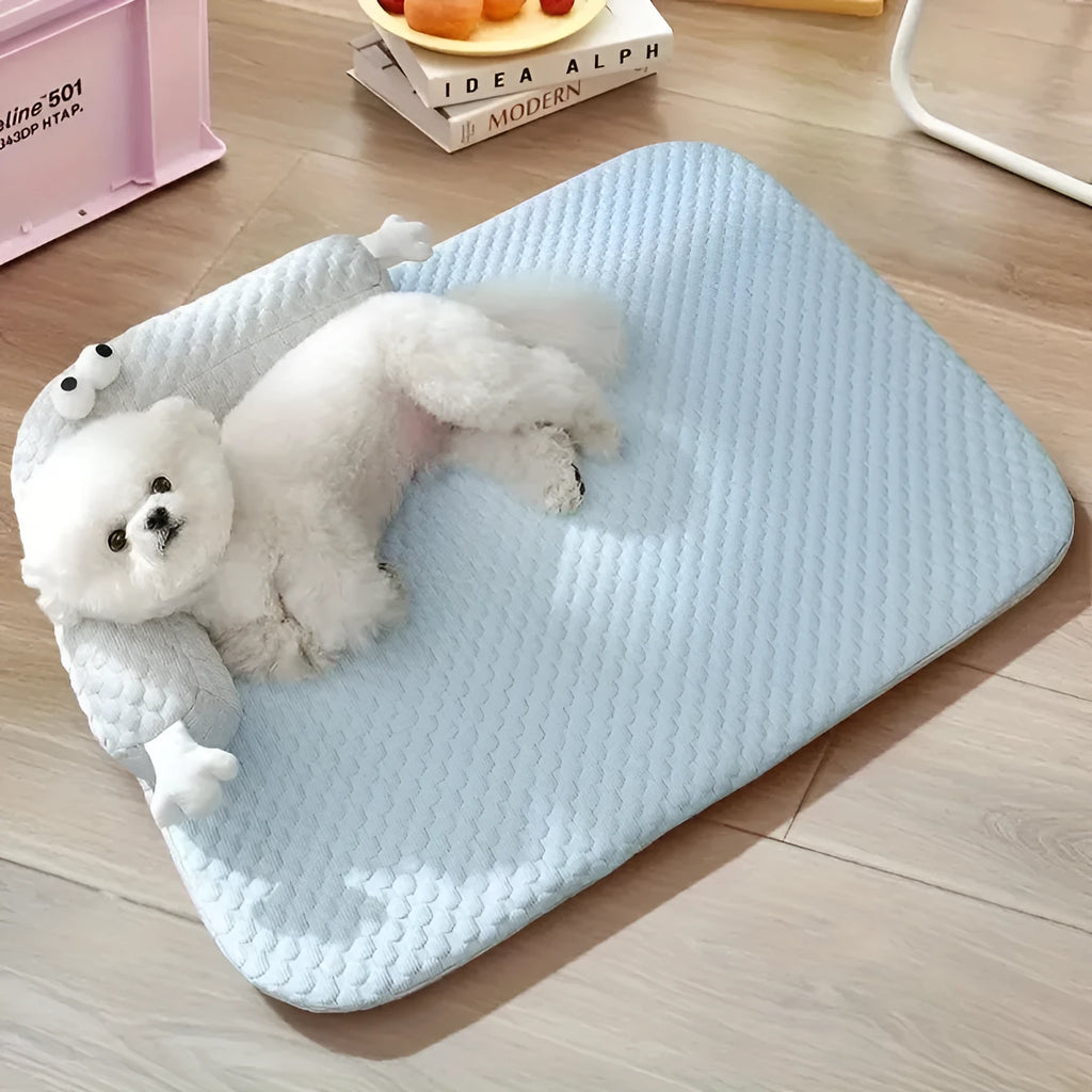 Blue pet bed with monster design showing breathable polyester fabric and non-slip base