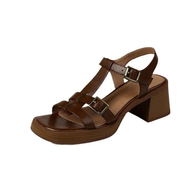 Women's black retro high heel sandals with a T-shaped buckle and chunky platform sole.