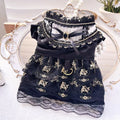 Golden Gothic princess-style skirt costume for a small dog or cat on a mannequin