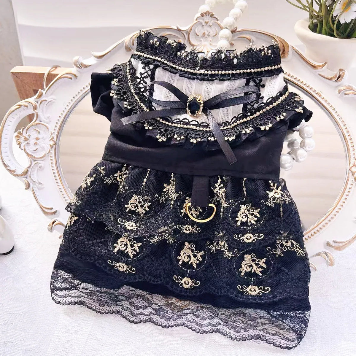 Golden Gothic princess-style skirt costume for a small dog or cat on a mannequin