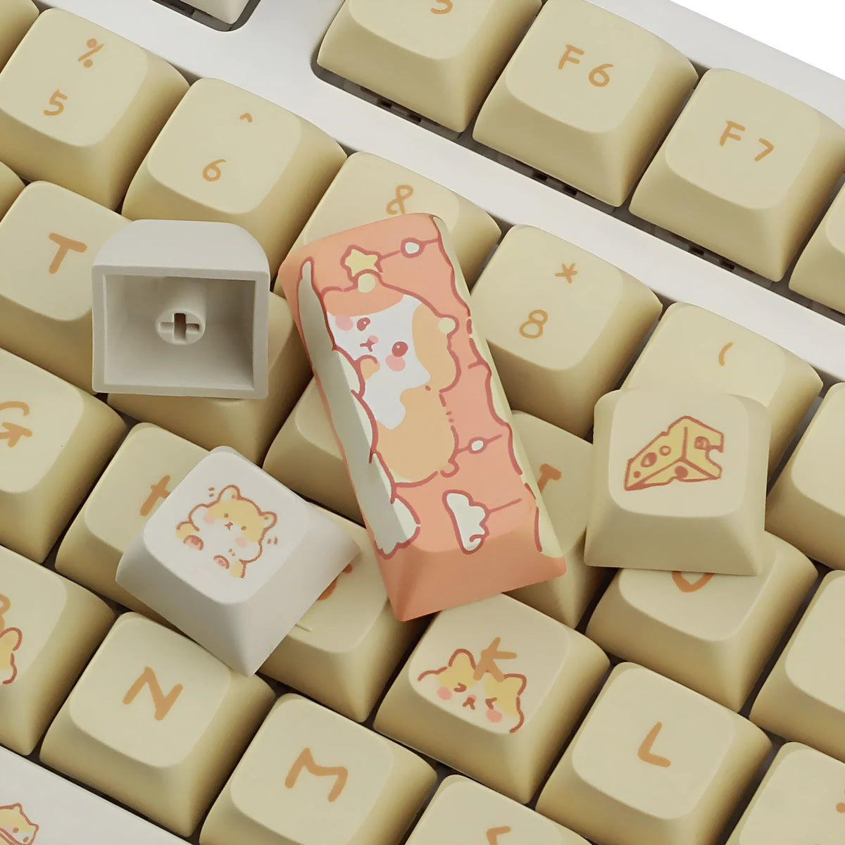 XDA profile mechanical keyboard keycaps in custard colour palette with grey and yellow accents