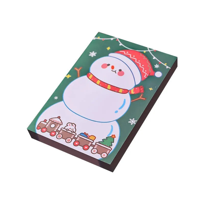 Christmas cartoon sticky notes pad with eight festive designs including elf, gift, sled, and Santa Claus